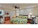 Spacious bedroom with a king-size bed and ceiling fan at 1890 Silver Fern Dr, Port Orange, FL 32128