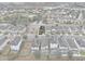 Aerial view of a house in a residential neighborhood with surrounding houses and amenities at 206 Aberdeen Street St, Davenport, FL 33896