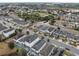 Aerial view of a residential community with houses and solar panels at 206 Aberdeen Street St, Davenport, FL 33896