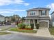 Two story home with landscaping and driveway at 206 Aberdeen Street St, Davenport, FL 33896