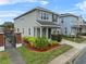 Two story home with landscaping and front yard at 206 Aberdeen Street St, Davenport, FL 33896