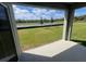 View from the back patio to the exterior of the home at 2214 Lake Preserve Cir, New Smyrna Beach, FL 32168