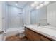 Modern bathroom with a floating vanity and tile shower at 2566 Ballard Ave, Orlando, FL 32833