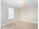 Empty bedroom with neutral walls and tile flooring at 2566 Ballard Ave, Orlando, FL 32833