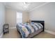 Bright bedroom with a comfortable bed and ample natural light at 2566 Ballard Ave, Orlando, FL 32833