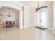 Elegant entryway with tile floors and chandelier at 2566 Ballard Ave, Orlando, FL 32833