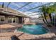 Relaxing kidney-shaped pool with brick patio and covered lanai at 2566 Ballard Ave, Orlando, FL 32833