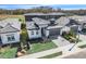 Aerial view of modern homes with gray roofs and landscaping at 3028 Kensington Ave, Davenport, FL 33837