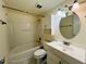 Clean bathroom with a bathtub, sink, and vanity at 318 Scottsdale Sq # 318, Winter Park, FL 32792