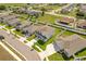 Aerial view of house and neighboring homes at 332 Bow Ln, Haines City, FL 33844