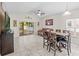 Bright dining area with a table and chairs, adjacent to the kitchen at 34405 Alameda Dr, Sorrento, FL 32776