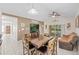 Gathering dining area with sliding doors leading to backyard at 34405 Alameda Dr, Sorrento, FL 32776