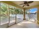 Relaxing screened porch overlooking the backyard at 34405 Alameda Dr, Sorrento, FL 32776