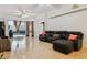 Living room with view of pool through sliding doors at 345 Via Bianca Dr, Davenport, FL 33896