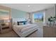 Bright bedroom with a king-size bed and en-suite bathroom at 3555 Chinkapin Oak Ln, Apopka, FL 32703