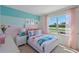 Charming bedroom with light walls and a playful ocean-themed bedding set at 3555 Chinkapin Oak Ln, Apopka, FL 32703