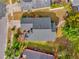 Top-down aerial view of house and surrounding landscape at 3890 Waterview Loop, Winter Park, FL 32792