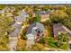 Aerial view of house, neighborhood, and distant city skyline at 3890 Waterview Loop, Winter Park, FL 32792