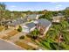 Aerial view of house and surrounding neighborhood at 3890 Waterview Loop, Winter Park, FL 32792