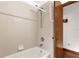 Simple bathroom with shower/tub combo and beige tile at 3890 Waterview Loop, Winter Park, FL 32792