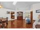 Living room with hardwood floors, a couch and a coffee table at 3890 Waterview Loop, Winter Park, FL 32792