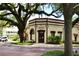 Historic town hall building with brick facade and unique architecture at 402 N Pollard St, Oakland, FL 34787