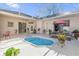 Inviting pool area with patio furniture at 4213 Whitemoor Ct, Clermont, FL 34711