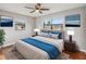 Main bedroom with hardwood floors and ample natural light at 4301 Lancashire Ln, Orlando, FL 32812