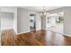 Bright dining room with hardwood floors and access to kitchen at 4301 Lancashire Ln, Orlando, FL 32812