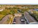 Aerial view showcasing building, parking and pond at 4767 S Texas Ave # 4767C, Orlando, FL 32839