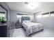 Bedroom with gray and white decor at 5006 Monet Ave, Belle Isle, FL 32812