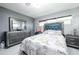 Bedroom with gray and white decor at 5006 Monet Ave, Belle Isle, FL 32812