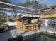 Outdoor pool area with covered bar and seating at 5006 Monet Ave, Belle Isle, FL 32812