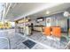 Outdoor kitchen and dining area with pool view at 5006 Monet Ave, Belle Isle, FL 32812