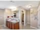 Main bathroom with double vanity and a separate toilet area at 6030 Forest Ridge Ln, Winter Haven, FL 33881