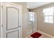 Bathroom with a shower and a red bathmat at 6030 Forest Ridge Ln, Winter Haven, FL 33881