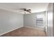 Simple bedroom with neutral walls and carpeted floors at 6030 Forest Ridge Ln, Winter Haven, FL 33881