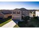 Two-story house with a large yard and solar panels at 6030 Forest Ridge Ln, Winter Haven, FL 33881