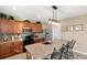 Modern kitchen with stainless steel appliances and an island at 6030 Forest Ridge Ln, Winter Haven, FL 33881