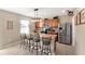 Modern kitchen with an island and stainless steel appliances at 6030 Forest Ridge Ln, Winter Haven, FL 33881