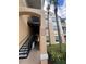 Stairwell entrance to condo building with unit numbers at 6100 Stevenson Dr # 105, Orlando, FL 32835