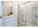 Clean bathroom with walk-in shower and white vanity at 6152 High Seas Dr, Orlando, FL 32821