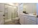 Clean bathroom with a walk-in shower and white vanity at 6152 High Seas Dr, Orlando, FL 32821