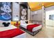 Mickey Mouse themed bedroom with two twin beds at 6152 High Seas Dr, Orlando, FL 32821