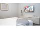 Cozy bedroom with queen bed and mounted TV at 6152 High Seas Dr, Orlando, FL 32821