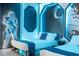 Star Wars themed bedroom with twin beds and blue lighting at 6152 High Seas Dr, Orlando, FL 32821