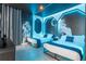 Star Wars themed bedroom with twin beds and blue lighting at 6152 High Seas Dr, Orlando, FL 32821