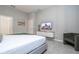 Bright bedroom with a comfy bed and a wall-mounted TV at 6152 High Seas Dr, Orlando, FL 32821