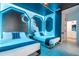 Star Wars themed bedroom with twin beds and blue lighting at 6152 High Seas Dr, Orlando, FL 32821