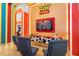 Playful Toy Story themed game room with arcade game and comfy seating at 6152 High Seas Dr, Orlando, FL 32821